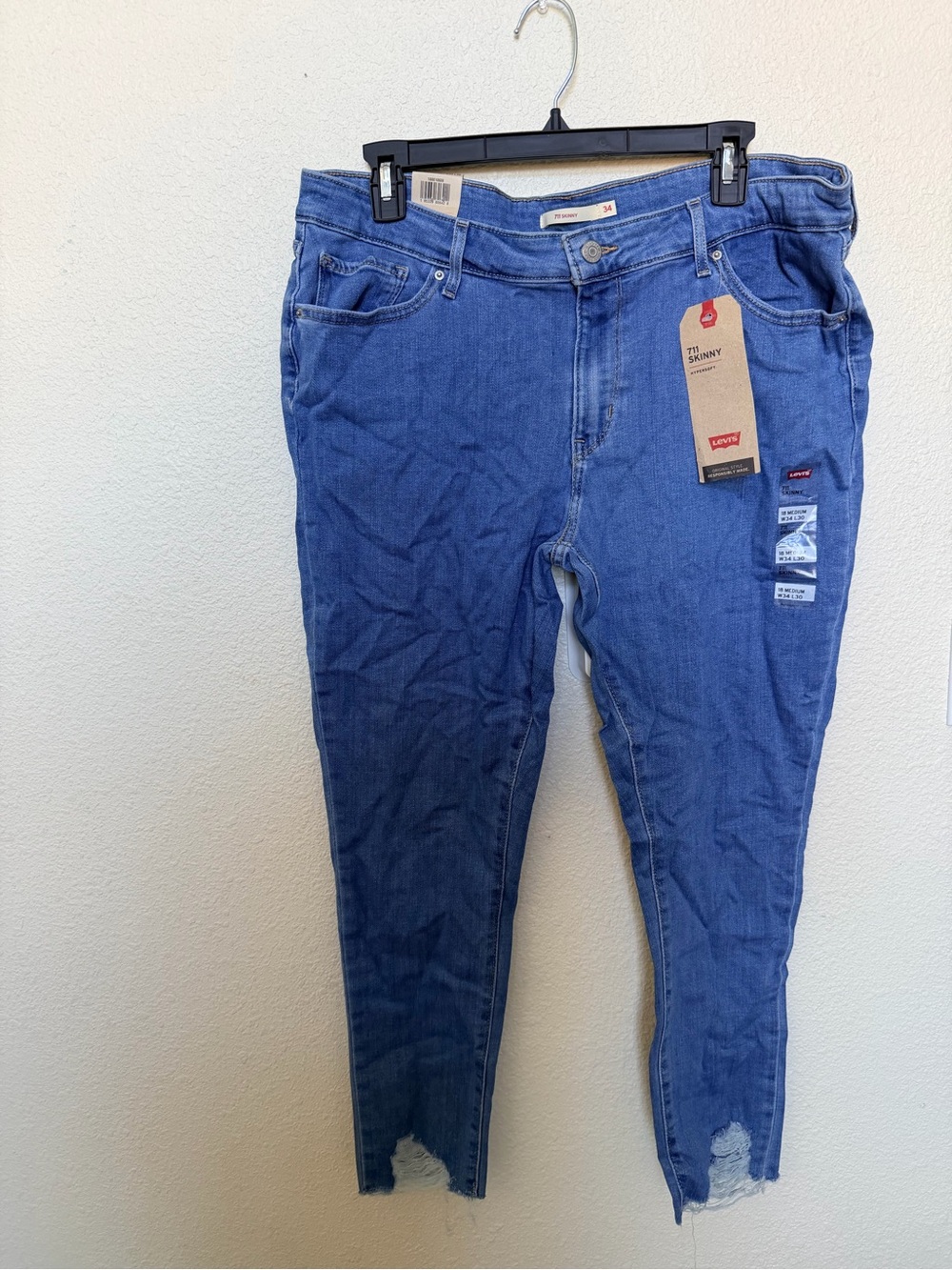 Levi's 711 Women's Medium Blue Skinny Jeans with Raw Hem